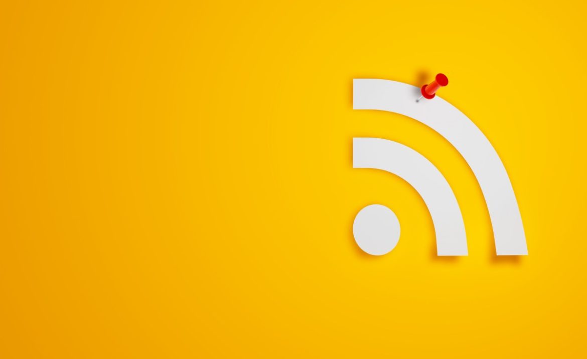 Pin Paper RSS Symbol on Yellow Background